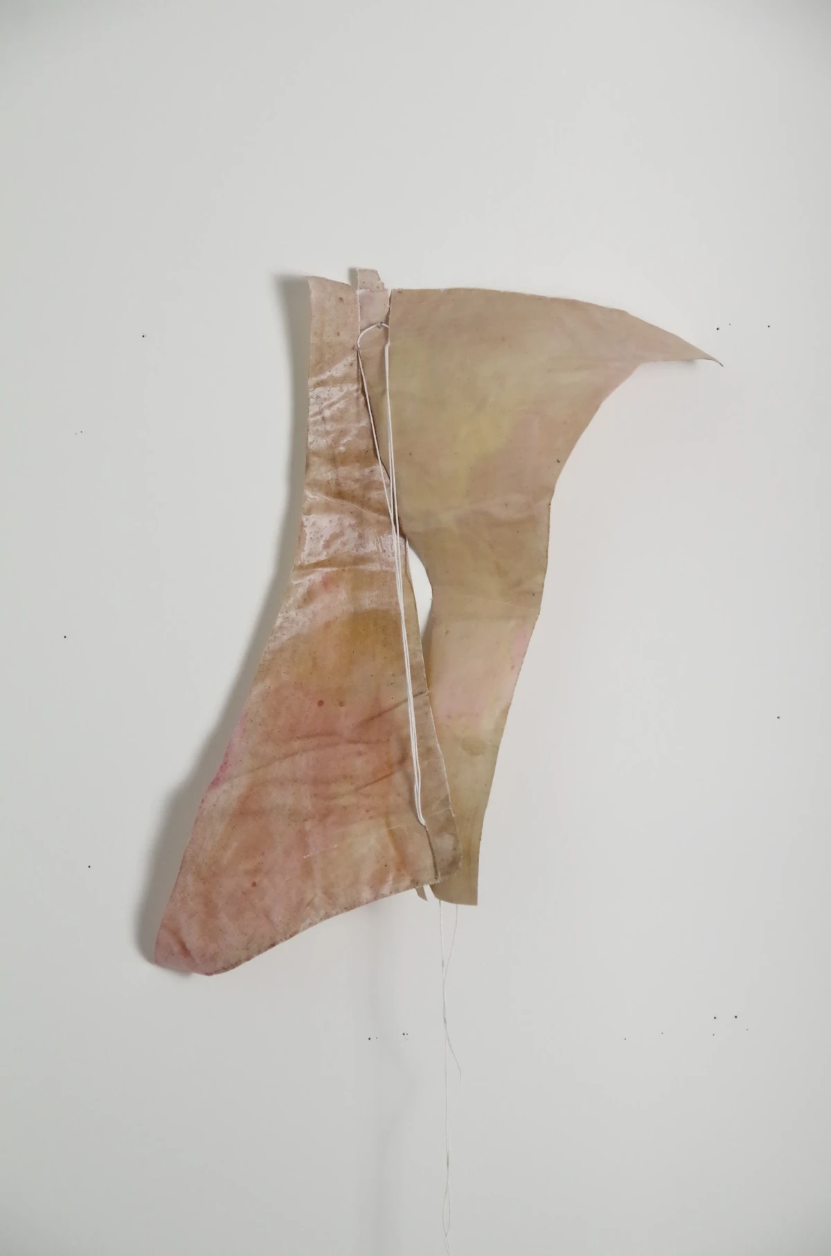 a shape [23/34/6 cm] textile remnants stiffened with flour paste - colored with self-produced pigments - zoe bilgeri/ 2024/ weimar