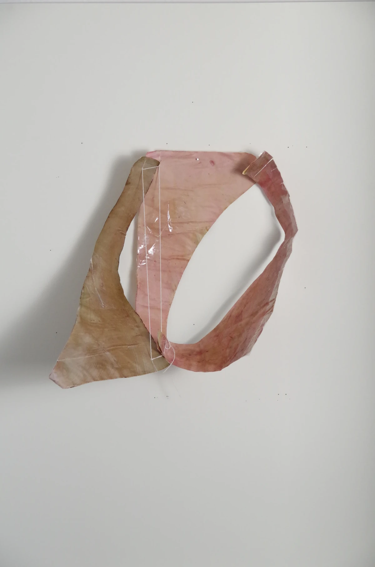 a shape [34/32/8 cm] textile remnants stiffened with flour paste - colored with self-produced pigments - zoe bilgeri/ 2024/ weimar