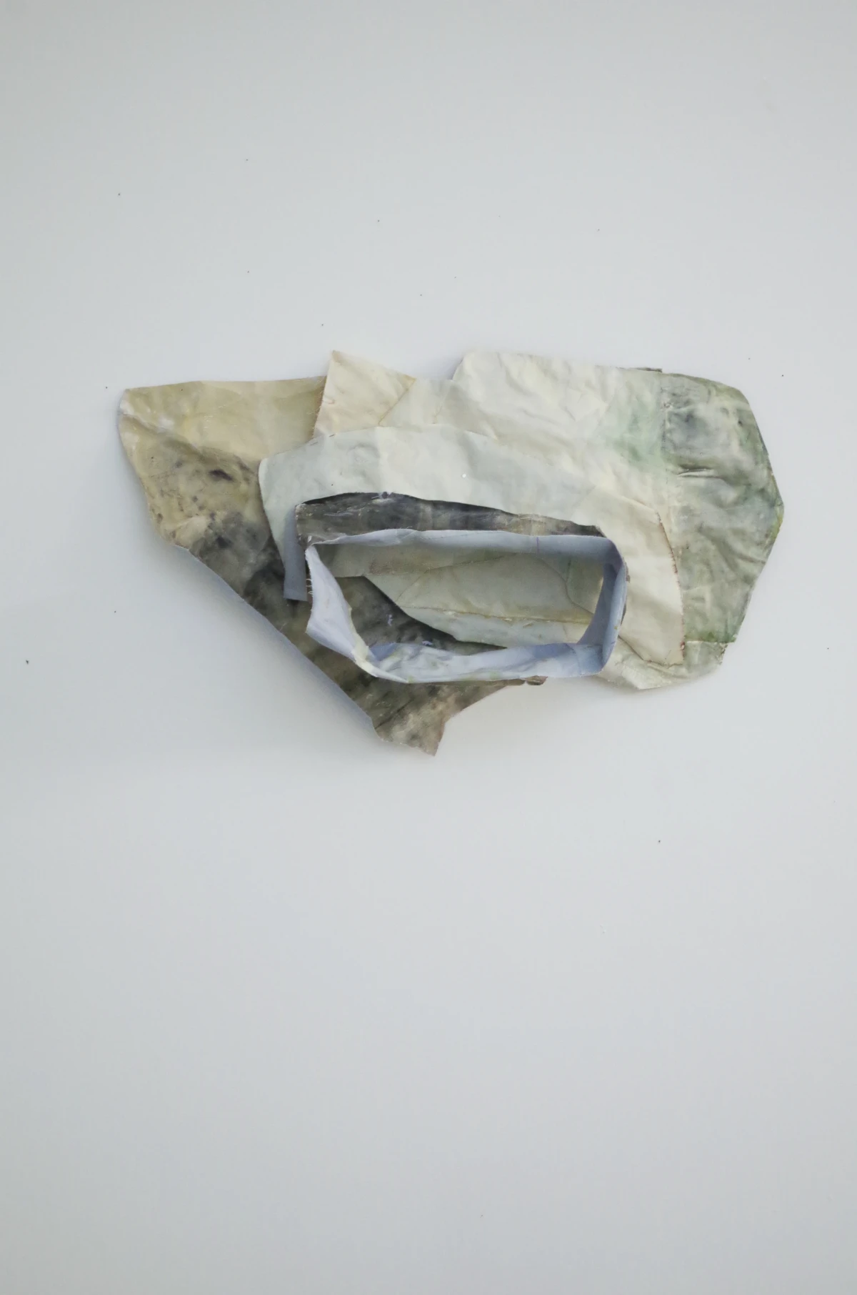 half - [76/45/24 cm] glued, plastered, coloured textile waste- zoe bilgeri/ 2025/ zuerich